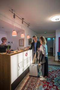 Apgyvendinimo įstaigoje Stüttgens Hotel viešintys svečiai