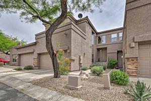 a house with a tree in front of it at Golf Course View and Pool Access Gold Canyon Gem in Gold Canyon