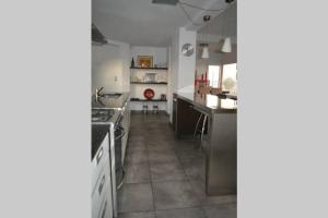 Kjøkken eller kjøkkenkrok på CASA AL LADO DEL MAR