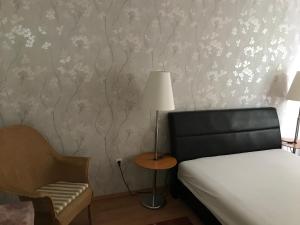 Posteľ alebo postele v izbe v ubytovaní Oleander Apartman