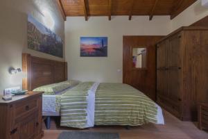 Posteľ alebo postele v izbe v ubytovaní Casa Rural Ayacata