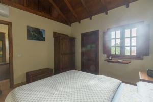 Posteľ alebo postele v izbe v ubytovaní Casa Rural Ayacata