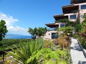 a house with a view of the ocean at Bohol Vantage Resort in Panglao Island