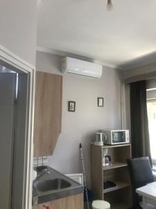 Kuchyňa alebo kuchynka v ubytovaní Oleander Apartman