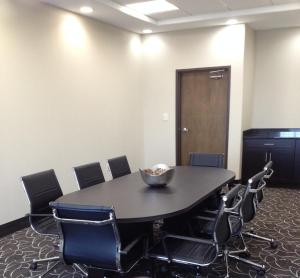 a conference room with a table and chairs at Garner Hotel Victoria - East by IHG in Victoria +22 photos