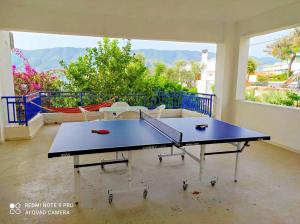 Stolní tenis v ubytování Rigos House at Askeli beach, Poros island nebo okolí