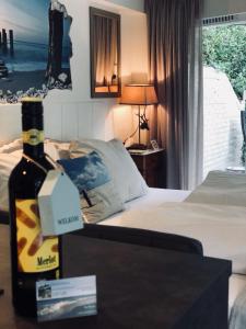 Tempat tidur dalam kamar di Tussenrenesseenstrand