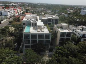 an aerial view of a building in a city at Kaab At The Park by The Spot Rentals in Playa del Carmen