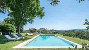 an image of a swimming pool in a yard at PODERE GRAGNANO 12, Emma Villas in Cetona