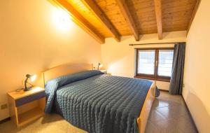 Postel nebo postele na pokoji v ubytování Casa Lori