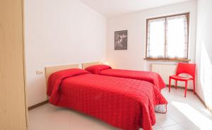 Postel nebo postele na pokoji v ubytování Casa Lori
