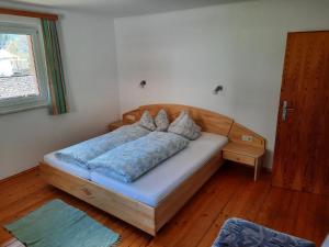 Postelja oz. postelje v sobi nastanitve Grünwald Chalet