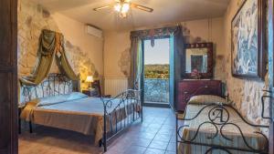 A bed or beds in a room at PODERE TORRICELLA 16, Emma Villas Még 37 kép