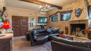 A seating area at PODERE TORRICELLA 16, Emma Villas