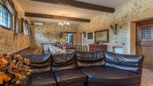 A seating area at PODERE TORRICELLA 16, Emma Villas
