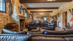 A seating area at PODERE TORRICELLA 16, Emma Villas