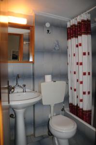 Koupelna v ubytování Ekavi Apartments