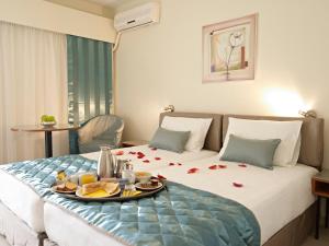 Postel nebo postele na pokoji v ubytování Hotel Galaxias
