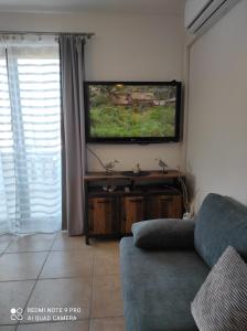 TV a/nebo společenská místnost v ubytování Galboka Nine