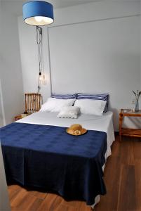 En eller flere senge i et værelse på Eutuxia Sea&Mountain Apartment - Tsoutsouros