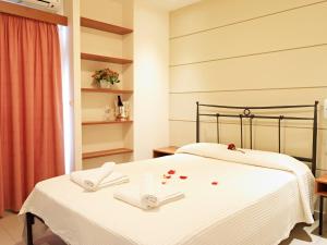 Postel nebo postele na pokoji v ubytování Hotel Galaxias