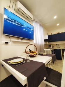 TV a/nebo společenská místnost v ubytování Apartman Stella Maris