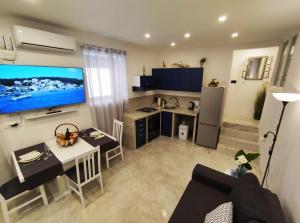 Kuchyň nebo kuchyňský kout v ubytování Apartman Stella Maris