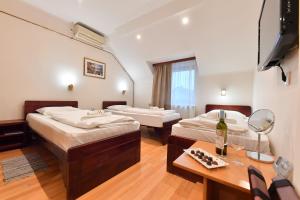 Postel nebo postele na pokoji v ubytování Apartments & Accommodation Stojic