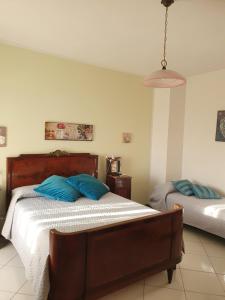 Postel nebo postele na pokoji v ubytování B&B Casa di Donna