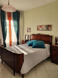 Postel nebo postele na pokoji v ubytování B&B Casa di Donna