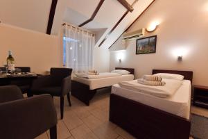 Postel nebo postele na pokoji v ubytování Apartments & Accommodation Stojic
