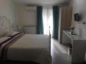 Posteľ alebo postele v izbe v ubytovaní Blue Sky House