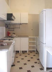 Kuchyň nebo kuchyňský kout v ubytování Villa Fede