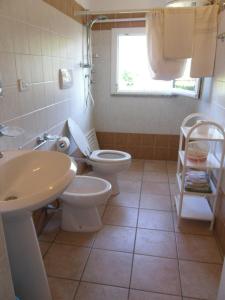 Kúpeľňa v ubytovaní Appartamenti Le Foci