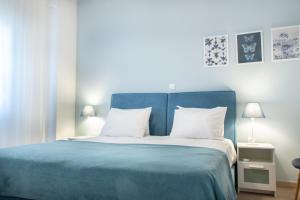 A bed or beds in a room at Beautiful house by the sea