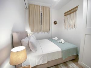 Ένα ή περισσότερα κρεβάτια σε δωμάτιο στο Beautiful house by the sea