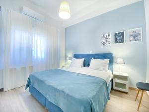 A bed or beds in a room at Beautiful house by the sea