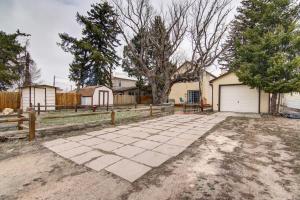 a house with a driveway and a fence at Monument Retreat - Walk to Local Dining and Shopping in Monument