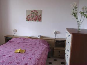 Postel nebo postele na pokoji v ubytování Villa Fede