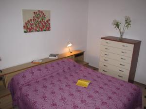Postel nebo postele na pokoji v ubytování Villa Fede