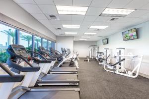 a gym with treadmills and elliptical machines at Club Wyndham Desert Blue in Las Vegas