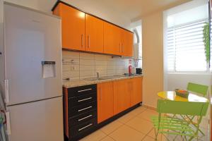 Kuchyň nebo kuchyňský kout v ubytování AlbufeiraMar Beach Apartment