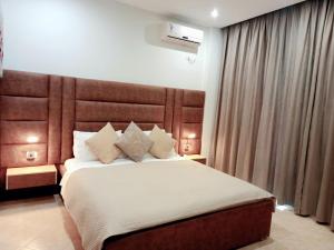 Postel nebo postele na pokoji v ubytování Hotel Relax Dhermi
