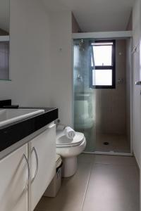 Ванная комната в Audaar Topazio Residencial