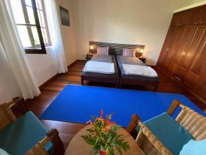 Postel nebo postele na pokoji v ubytování Quinta Perpetua, Casa Pico
