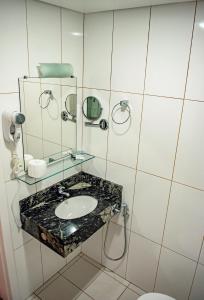 Koupelna v ubytování Charrua Hotel