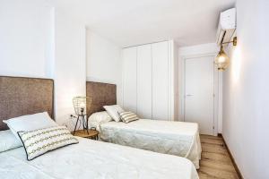 Posteľ alebo postele v izbe v ubytovaní GLP Dreams Torre Alazan
