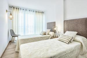 Posteľ alebo postele v izbe v ubytovaní GLP Dreams Torre Alazan