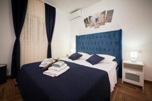Postel nebo postele na pokoji v ubytování New 4* apartman Zoa in Trogir