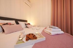 Postel nebo postele na pokoji v ubytování New 4* apartman Zoa in Trogir